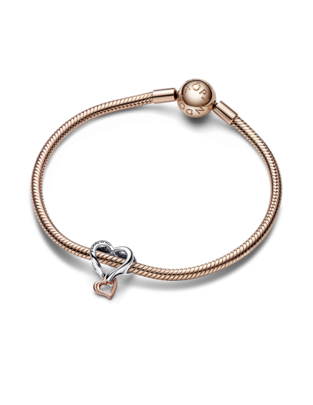 Charm en plata de ley y con un recubrimiento en oro rosa de 14k Corazón Infinito en Filigrana en Dos Tonos